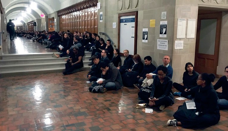 Yale Law School students hold a sit-in in the Sterling Law Building in New Haven, Conn., Monday morning, Sept. 24, 2018, to protest the nomination of Judge Brett Kavanaugh to the Supreme Court and demand an investigation into sexual misconduct allegations against him.