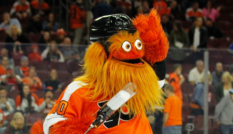 The Philadelphia Flyers mascot, Gritty, takes to the ice during the first intermission of the Flyers' preseason NHL hockey game against the Boston Bruins, Monday, Sept, 24, 2018, in Philadelphia.