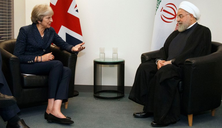 British Prime Minister Theresa May meets with Iranian President Hassan Rouhani on the sidelines of the 73rd session of the United Nations General Assembly at U.N. headquarters, Tuesday, Sept. 25, 2018.