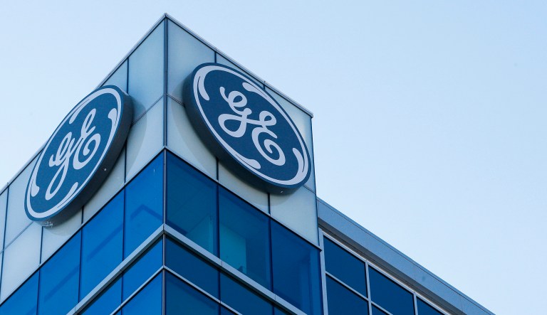 In this Jan. 16, 2018, file photo, the General Electric logo is displayed at the top of their Global Operations Center in downtown Cincinnati.