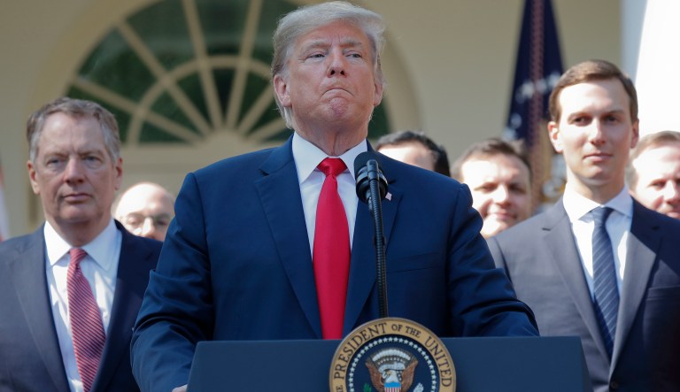President Donald Trump pauses as he takes questions from members of the media about Supreme Court nominee Judge Brett Kavanaugh in the Rose Garden of the White House in Washington, Monday, Oct. 1, 2018. Standing behind Trump are U.S. Trade Representative Ambassador Robert Lighthizer, left, and White House Senior Adviser Jared Kushner, right.