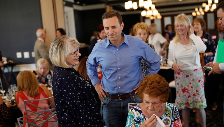 Nevada state Attorney General Adam Laxalt, center, meets with members of the Southern Hills Republican Women's Club in Henderson, Nev.