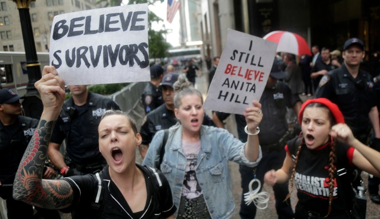 Protesters rally in front of Trump Tower in New York, Thursday, Oct. 4, 2018. Hundreds of people rallied in front of Trump Tower then walked to Times Square to protest Supreme Court nominee Brett Kavanaugh.