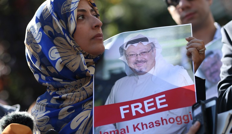 Holding a picture of missing Saudi writer Jamal Khashoggi, Tawakkol Karman, of Yemen the Nobel Peace Prize laureate for 2011, talks to members of the media near the Saudi Arabia consulate in Istanbul, Friday, Oct. 5, 2018. Khashoggi, a 59-year-old veteran journalist who has lived in self-imposed exile in the U.S. since Prince Mohammed's rise to power, disappeared Oct. 2 while on a visit to the consulate to get paperwork done to be married to his Turkish fiancÃ©e.