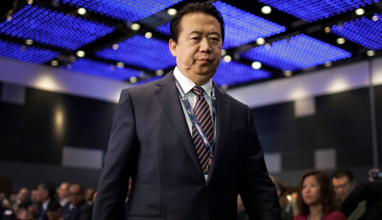 FILE - In this July 4, 2017 file photo, Interpol President, Meng Hongwei, walks toward the stage to deliver his opening address at the Interpol World congress in Singapore. A French judicial official says Friday Oct.5, 2018 the president of Interpol has been reported missing after traveling to China.