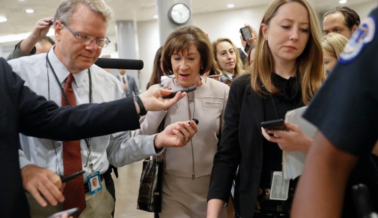 Sen. Susan Collins, R-Maine, is followed by members of the media as she walks over before a vote to advance Brett Kavanaugh's nomination to the Supreme Court, on Capitol Hill, Friday, Oct. 5, 2018 in Washington.