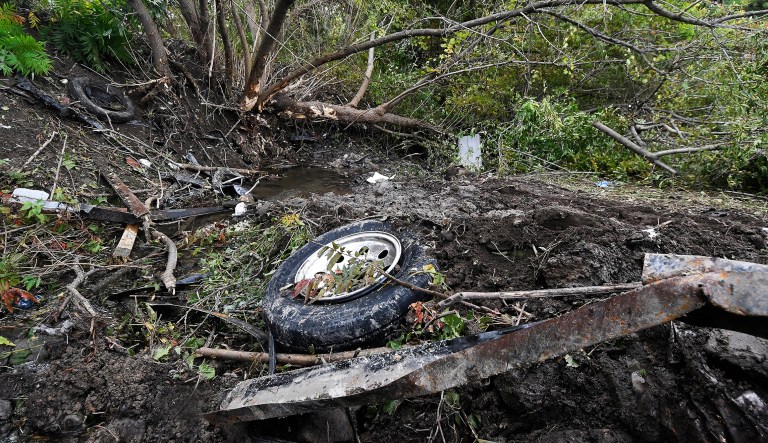 Debris scatters an area on Sunday, Oct. 7, 2018, at the site of yesterday's fatal crash Schoharie, N.Y. 