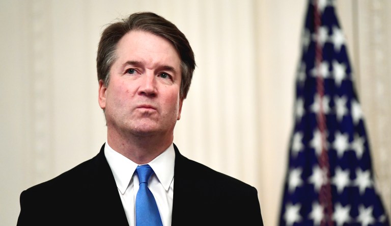 Supreme Court Justice Brett Kavanaugh stands before a ceremonial swearing-in in the East Room of the White House in Washington, Monday, Oct. 8, 2018.