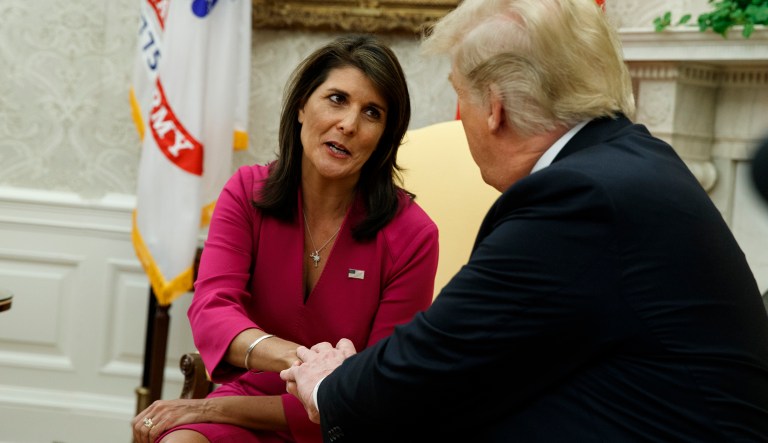 President Donald Trump meets with outgoing U.S. Ambassador to the United Nations Nikki Haley in the Oval Office of the White House, Tuesday, Oct. 9, 2018, in Washington.