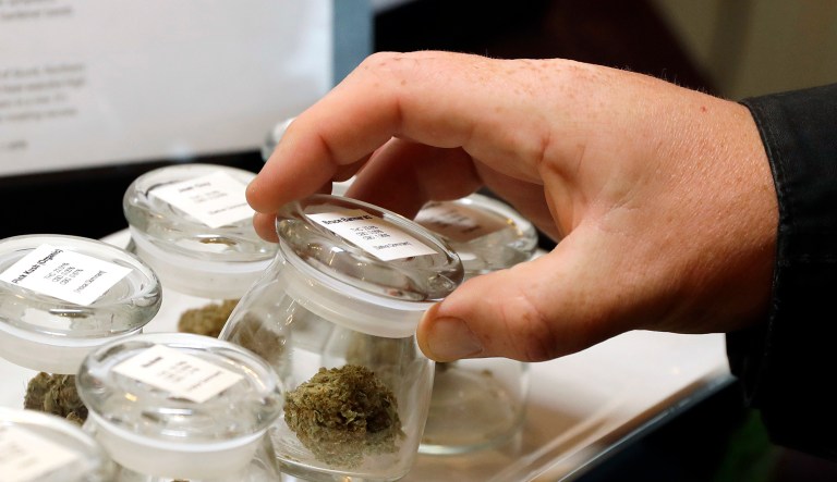 Different strains of marijuana are displayed for sale at the Warmland Centre, a medical marijuana dispensary in Mill Bay, British Columbia on Vancouver Island in Canada.