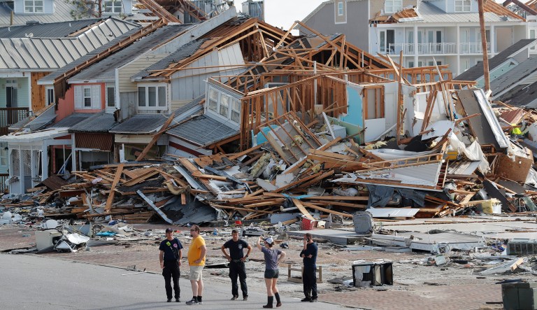 Rescue personnel perform a search in the aftermath of Hurricane Michael in Mexico Beach, Fla., Thursday, Oct. 11, 2018.