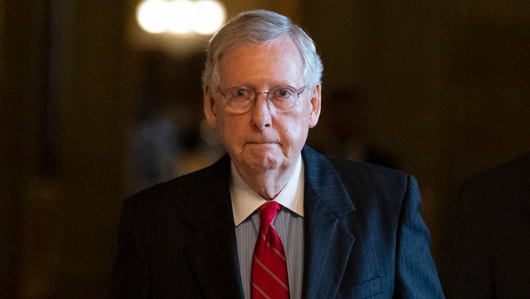 Senate Majority Leader Mitch McConnell of Ky., walks to the Senate floor for a vote.