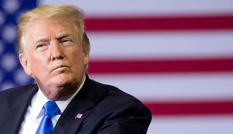 President Trump pauses while speaking at a rally at Alumni Coliseum in Richmond, Ky., Saturday, Oct. 13, 2018.