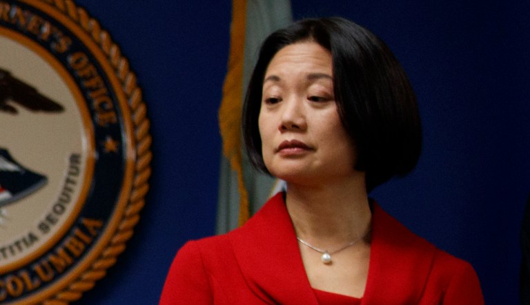 Attorney General Jeff Sessions, joined by Deputy Attorney General Rod Rosenstein, left, and Jessie Liu, U.S. Attorney for the District of Columbia, right, speaks during a news conference at the U.S. Attorney's Office for the District of Columbia in Washington, Monday, Oct. 15, 2018, to announce on efforts to reduce transnational crime.