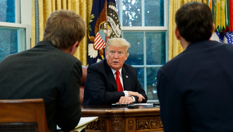President Trump speaks during an interview with The Associated Press in the Oval Office.
