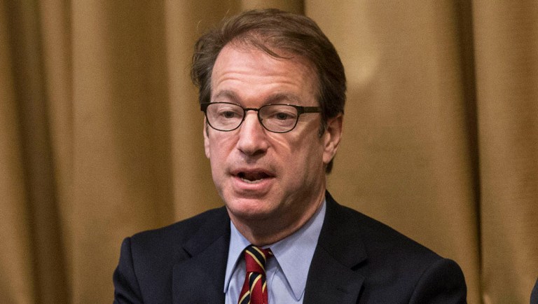 Rep. Peter Roskam speaks to reporters before a reception at Chicago Marriot Hotel-Naperville.
