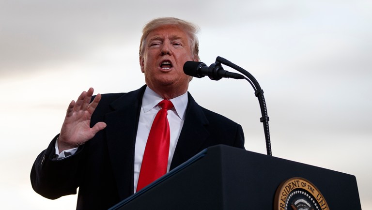 President Trump speaks at a campaign rally at Minuteman Aviation Hangar.