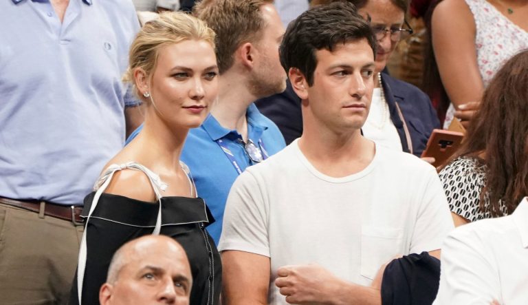 In this Sept. 6, 2018 photo, Karlie Kloss, top left, and Joshua Kushner attend the semifinals of the U.S. 