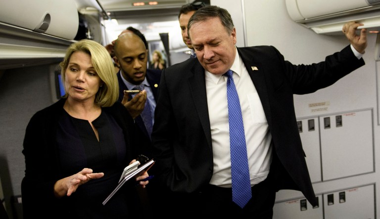 State Dept. spokesperson Heather Nauert, left, and Secretary of State Mike Pompeo speak with reporters in his plane while flying from Panama to Mexico, Thursday, Oct. 18, 2018. 
