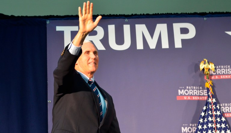 Vice President Mike Pence waves at a campaign rally at the North Central West Virginia Airport, Saturday, Oct. 20, 2018, in Bridgeport, W.Va. Pence made his second stop in West Virginia in the past three months to rally for Republican U.S. Senate nominee Morrisey on Saturday night. 