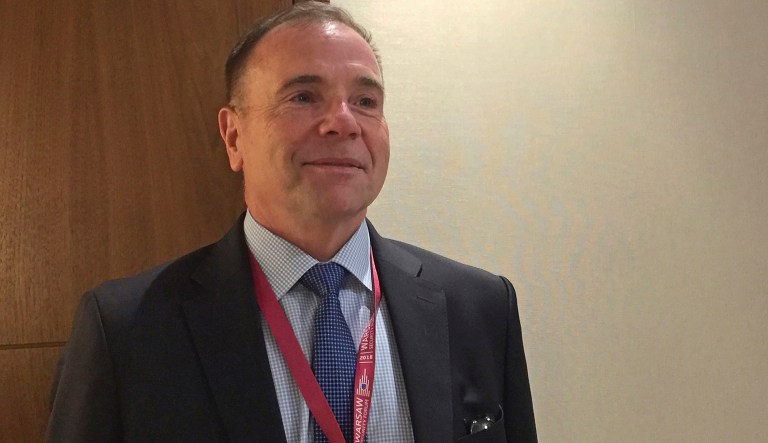 Retired Lt. Gen. Ben Hodges speaks to reporters on the sideline of the Warsaw Security Forum in Warsaw, Poland, Wednesday Oct. 24, 2018.  Hodges, who was U.S. Army commander in Europe from 2014-17, told the forum that it's likely but not inevitable that the United States will be at war with China in 15-years.