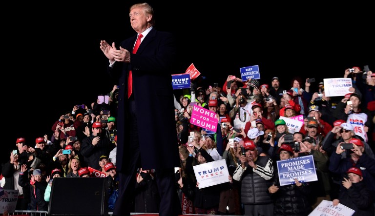 President Donald Trump arrives to speak at a rally at Central Wisconsin Airport in Mosinee, Wis., Wednesday, Oct. 24, 2018.