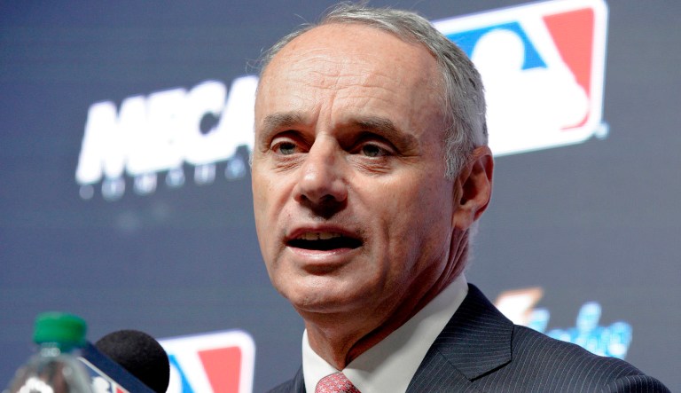 Major League Baseball commissioner Rob Manfred speaks during a news conference.