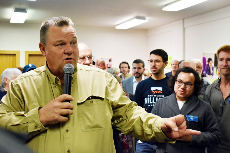 Montana Democratic Sen. Jon Tester talks with supporters at a campaign rally at the Billings Education Association headquarters in Billings, Mont., Friday, Oct. 26, 2018. Conservative groups linked to wealthy donors are saturating Montana airwaves with ads attacking Tester as they try to capitalize on President Donald Trump's feud with the lawmaker.
