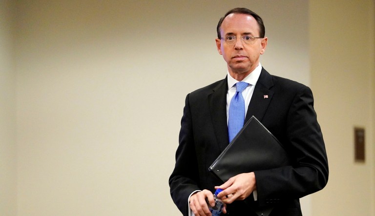 Deputy Attorney General Rod Rosenstein waits to speak at an event.