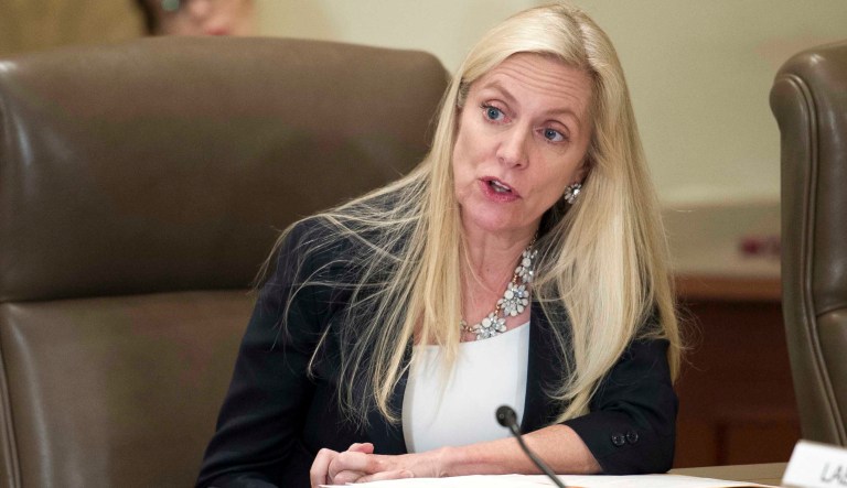 In this June 14, 2018 photo Federal Reserve Board Governor Lael Brainard participates in an open meeting in Washington. 