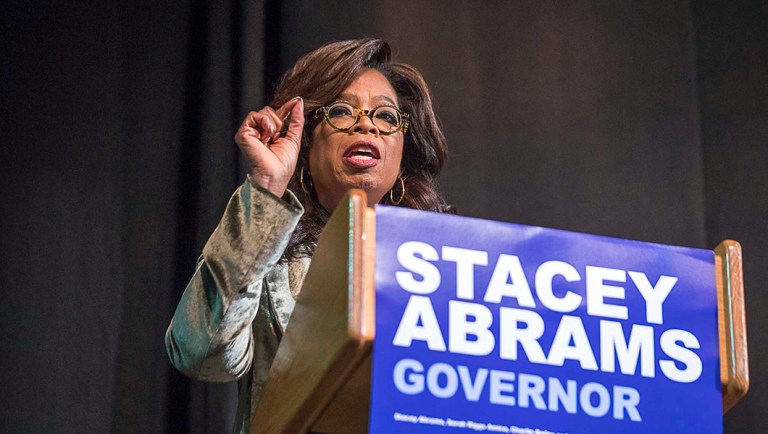 Oprah Winfrey speaks to a crowd during a town hall conversation.