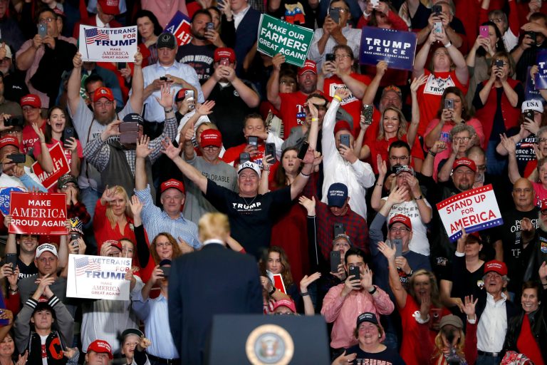 Members of the audience cheer as President Trump leaves the stage at the end of a campaign rally Monday, Nov. 5, 2018, in Cape Girardeau, Mo.