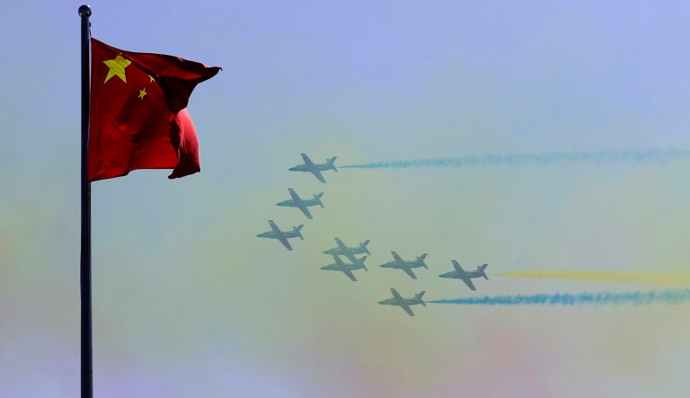 China's K-8 aircraft from the Aerobatic Team "Hongying", meaning Red Eagle, of Chinese PLA's (People's Liberation Army) Air Force, perform during the 12th China International Aviation and Aerospace Exhibition, also known as Airshow China 2018, Tuesday, Nov. 6, 2018, in Zhuhai city, south China's Guangdong province.