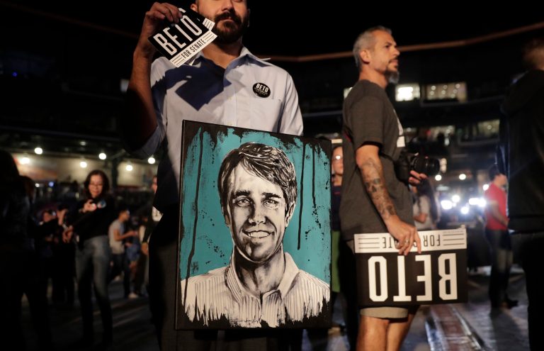 Erik Angel holds a portrait of Rep. Beto O'Rourke, the 2018 Democratic candidate for Senate in Texas, at O'Rourke's election night party, Tuesday, Nov. 6, 2018, in El Paso, Texas. 