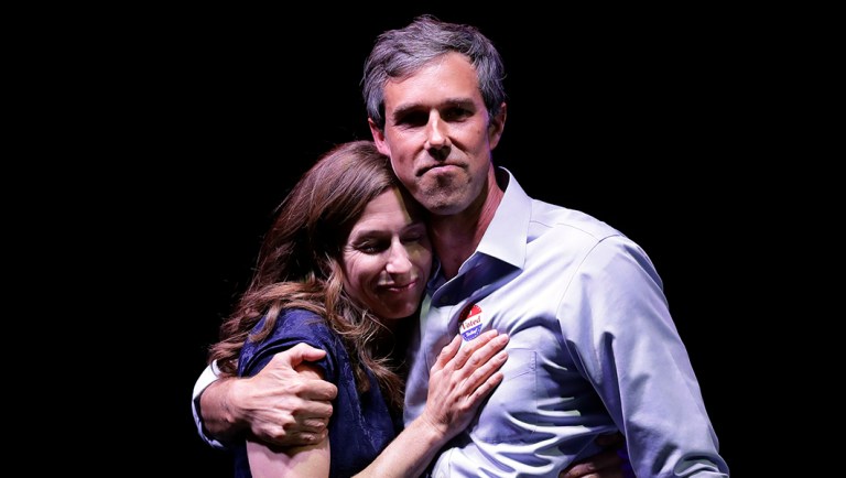 U.S. Rep. Beto O'Rourke, the 2018 Democratic Candidate for U.S. Senate in Texas, right, and his wife, Amy Sanders, stand together during his election night party.
