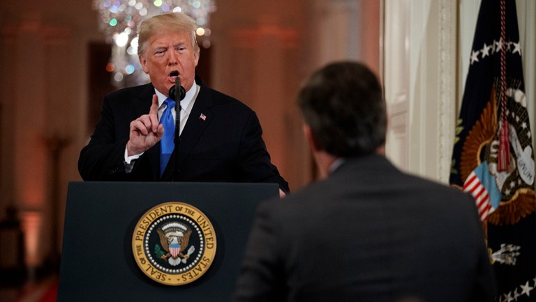 President Trump speaks to CNN journalist Jim Acosta during a news conference in the East Room.