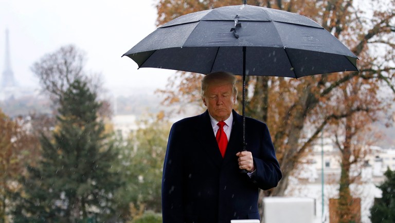 President Trump stands amongst the headstones during an American Commemoration Ceremony.