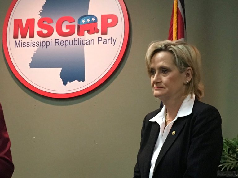 Republican U.S. Sen. Cindy Hyde-Smith of Mississippi appeared at a news conference at the state Republican Party headquarters in Jackson, Miss., on Monday, Nov. 12, 2018, and said repeatedly that she would not answer questions about a video that showed her at a Nov. 2 campaign event in Tupelo, Miss., where she praised a man by saying: "If he invited me to a public hanging, I'd be on the front row." Hyde-Smith issued a statement Sunday saying the remark was "an exaggerated expression of regard" for a friend who invited her to speak, and "any attempt to turn this into a negative connotation is ridiculous." Hyde-Smith was appointed to serve temporarily in the Senate after longtime Republican Sen. Thad Cochran retired in April, and she faces an African-American Democrat, Mike Espy, in a Nov. 27, 2018, runoff. Espy is a former congressman and former U.S. agriculture secretary. The runoff winner will serve the final two years of the six-year term started by Cochran.
