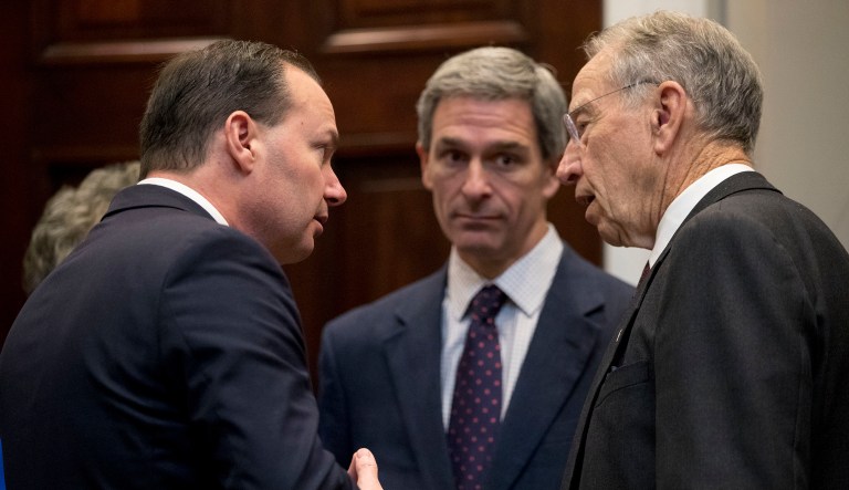 From left, Sen. Mike Lee, R-Utah, former Virginia Attorney General Ken Cuccinelli, and Sen. Chuck Grassley, R-Iowa, speak before President Trump announced his support for the first major rewrite of the nation's criminal justice sentencing laws in a generation in the Roosevelt Room of the White House in Washington, Wednesday, Nov. 14, 2018.