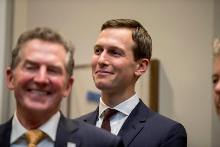 President Trump's White House Senior Adviser Jared Kushner, right, smiles as former Sen. Jim DeMint of the Heritage Foundation, left, applauds as Trump recognizes Kushner as he speaks about H. R. 5682, the "First Step Act" in the Roosevelt Room of the White House in Washington, Wednesday, Nov. 14, 2018, which would reform America's criminal justice system.