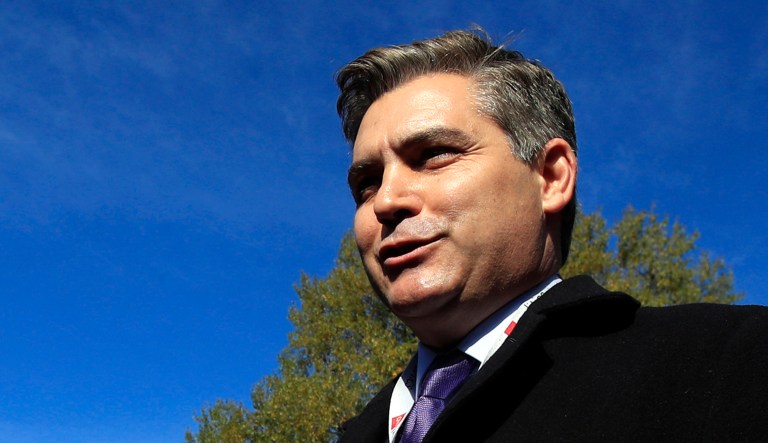 CNN's Jim Acosta speaks to journalists on the North Lawn upon returning back to the White House in Washington, D.C.