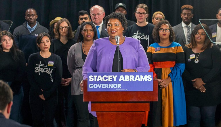 Georgia gubernatorial candidate Stacey Abrams makes remarks during a press conference at the Abrams Headquarters in Atlanta, Friday, Nov. 16, 2018. Democrat Stacey Abrams says she will file a federal lawsuit to challenge the "gross mismanagement" of Georgia elections. Abrams made the comments in a Friday speech, shortly after she said she can't win the race, effectively ending her challenge to Republican Brian Kemp. 