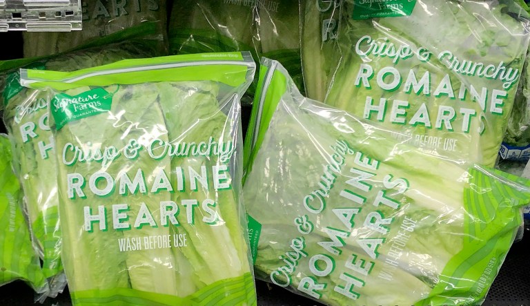 Romaine lettuce still sits on the shelves in the produce area of an Albertsons market Tuesday, Nov. 20, 2018, in Simi Valley, Calif.