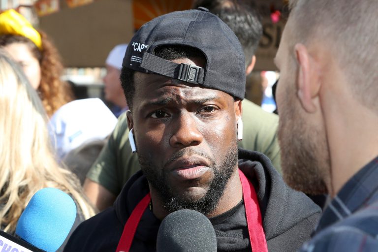Kevin Hart talks to the media on the day he volunteers to serve Thanksgiving dinner to a group of homeless people at the Los Angeles Mission on Wednesday, Nov. 21, 2018, in Los Angeles.