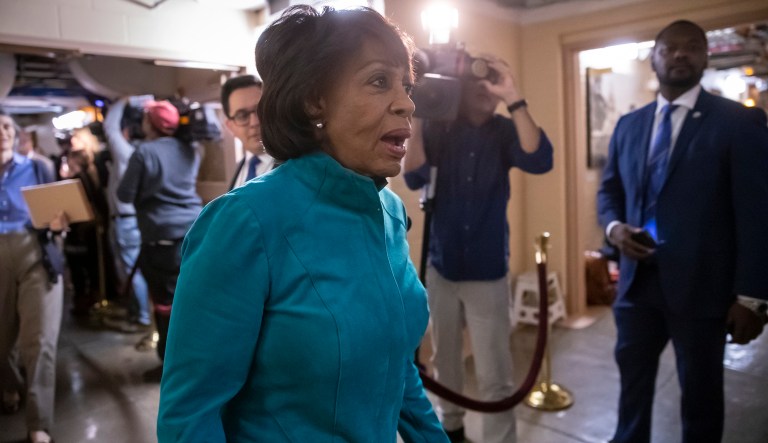 In this photo taken in Washington, Thursday, Nov. 15, 2018, Rep. Maxine Waters, D-Calif., ranking member of the Committee on Financial Services, walks through the basement of the Capitol as new members of the House and veteran representatives gather behind closed doors to discuss their agenda when they become the majority in the 116th Congress.