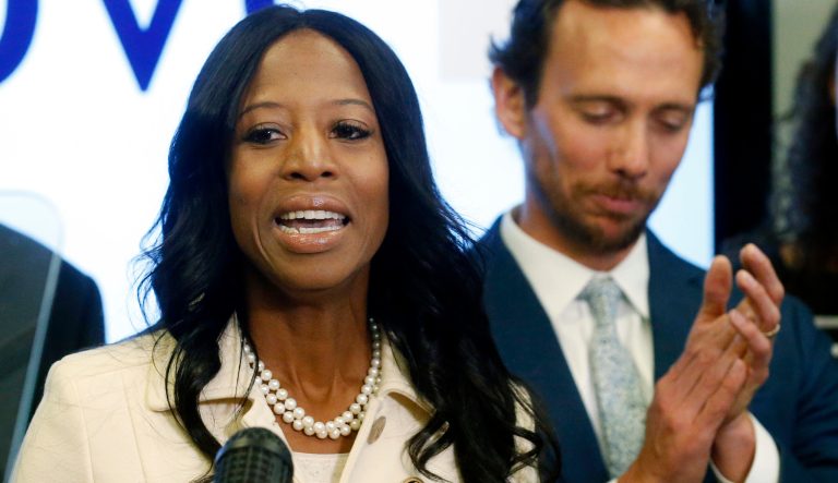 Surrounded by her family, Rep. Mia Love, R-Utah, talks about election results in the 4th Congressional District at the Utah Republican Party headquarters Monday Nov. 26, 2018, in Salt Lake City. 