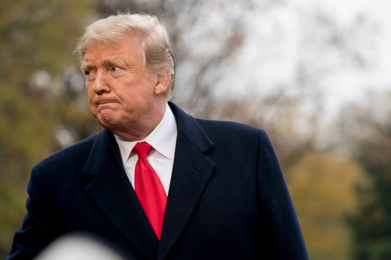 President Donald Trump listens to a questions as he speaks to members of the media before boarding Marine One on the South Lawn of the White House in Washington, Monday, Nov. 26, 2018, for a short trip to Andrews Air Force Base, Md., and then on to Mississippi for rallies.