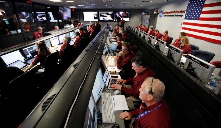 Engineers monitor the landing of InSight in the mission support area of the space flight operation facility at NASA's Jet Propulsion Laboratory on Nov. 26, 2018 in Pasadena, Calif.  