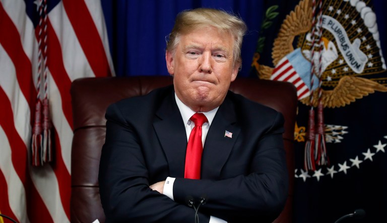 President Trump listens during a roundtable discussion on the First Step Act, Monday, Nov. 26, 2018, in Gulfport, Miss.