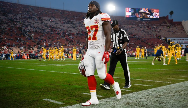 Kansas City Chiefs running back Kareem Hunt walks off the field prior to an NFL football game against the Los Angeles Rams Monday, Nov. 19, 2018, in Los Angeles.